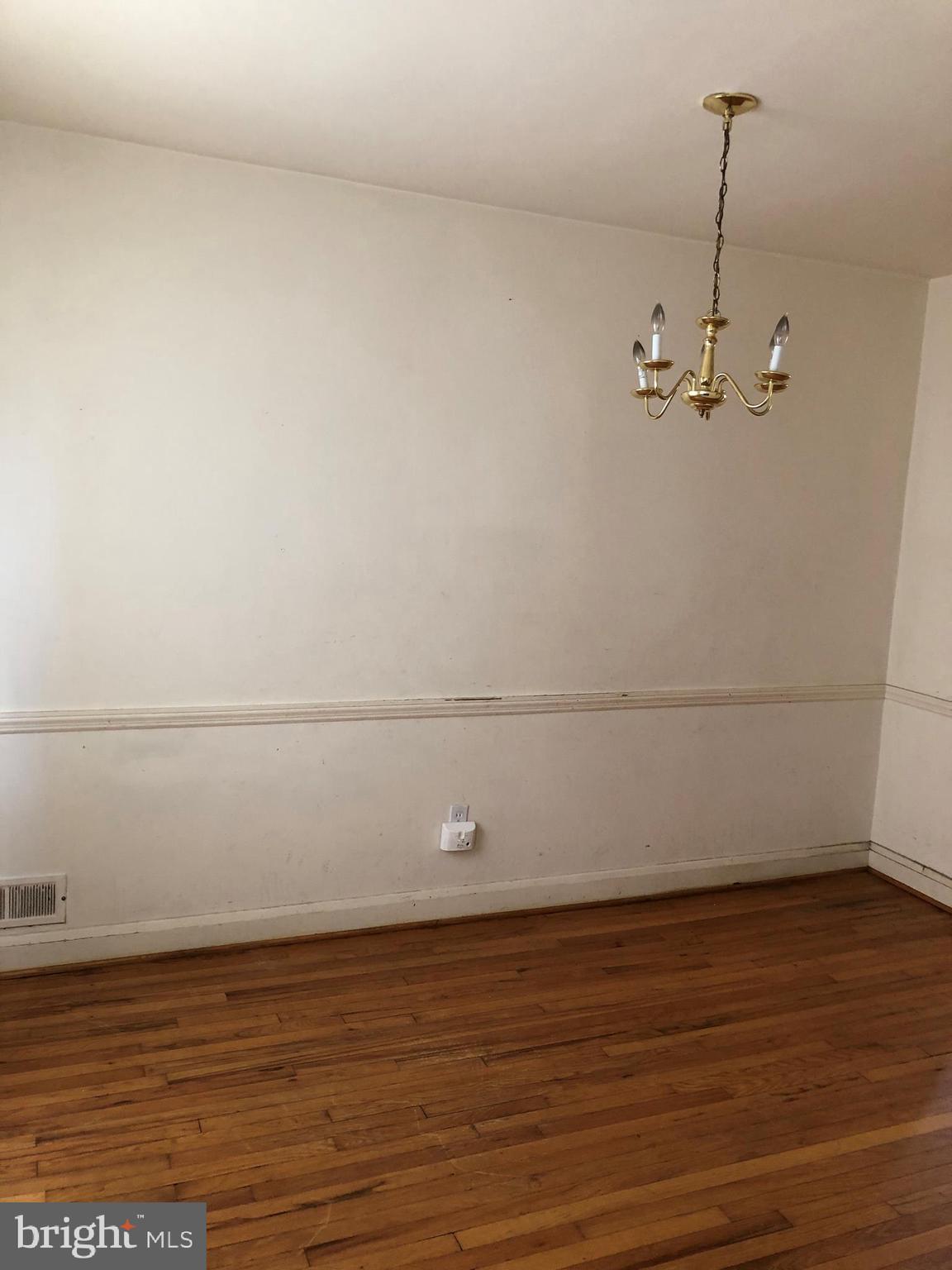 3710 Springwood Avenue Baltimore, MD 21206 - Photo 3 of 12 a view of a room with an empty space