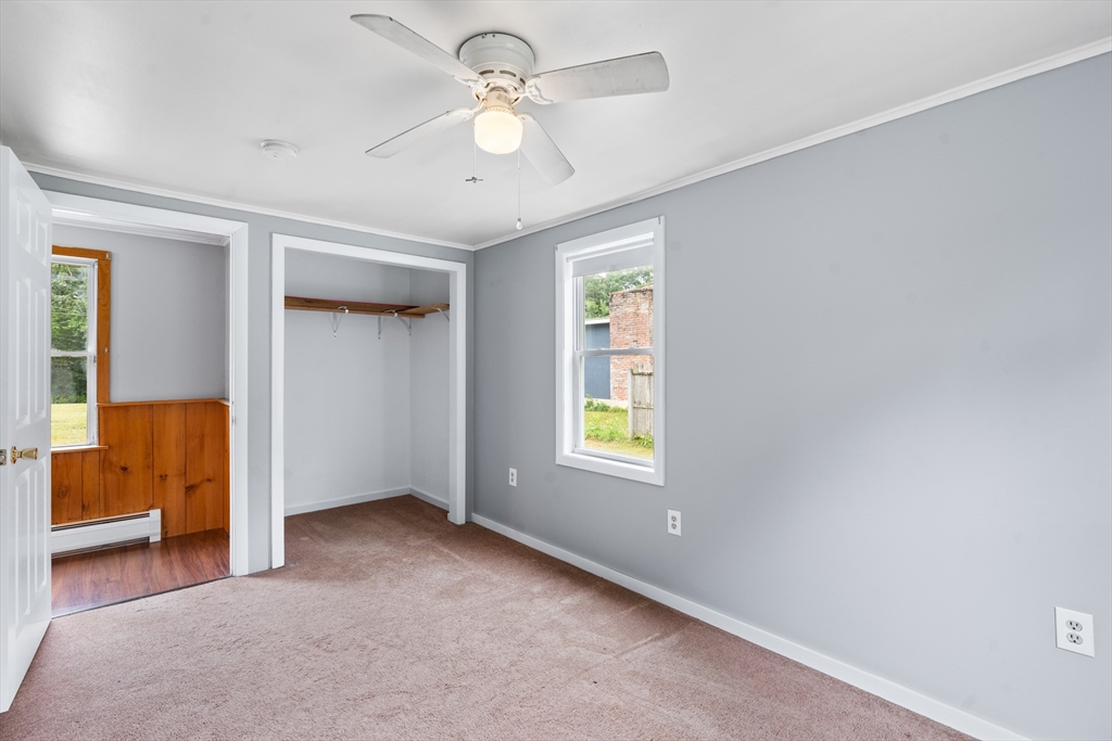 24 Horton Road Orange, MA 01364 - Photo 14 of 32 a view of an empty room with a window