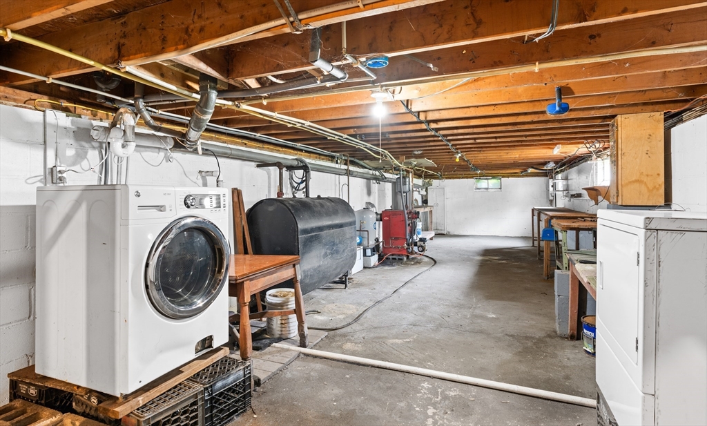 24 Horton Road Orange, MA 01364 - Photo 16 of 32 a utility room with dryer and washer