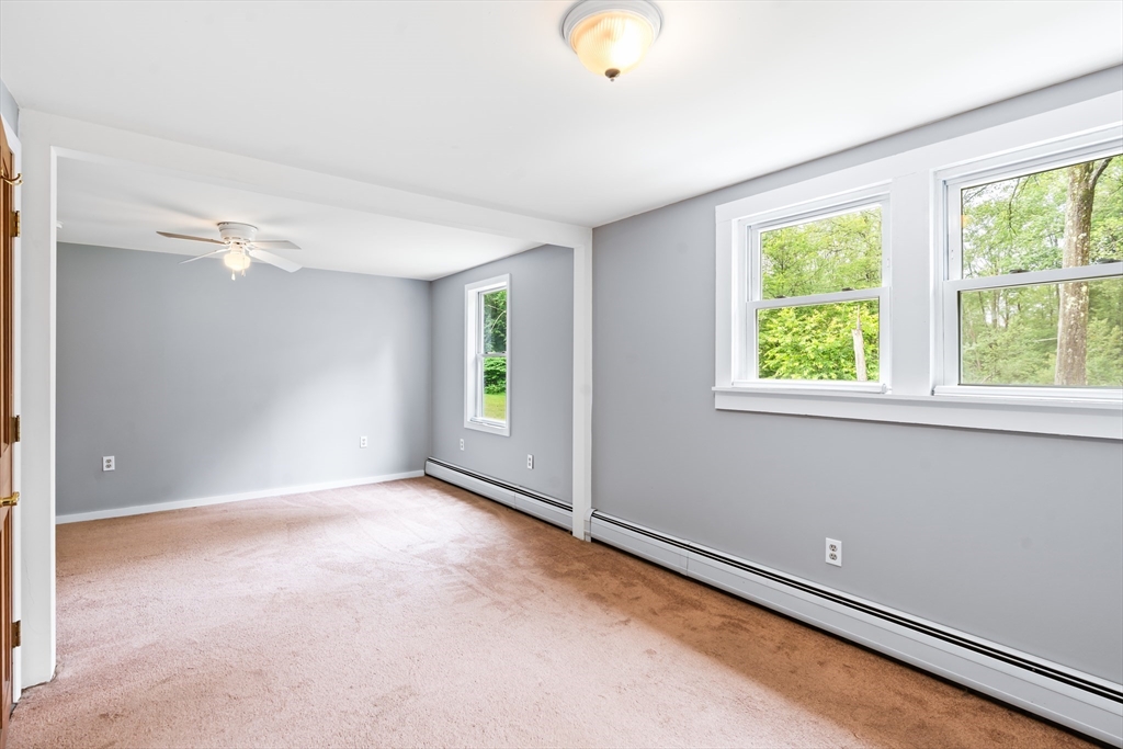 24 Horton Road Orange, MA 01364 - Photo 7 of 32 an empty room with windows