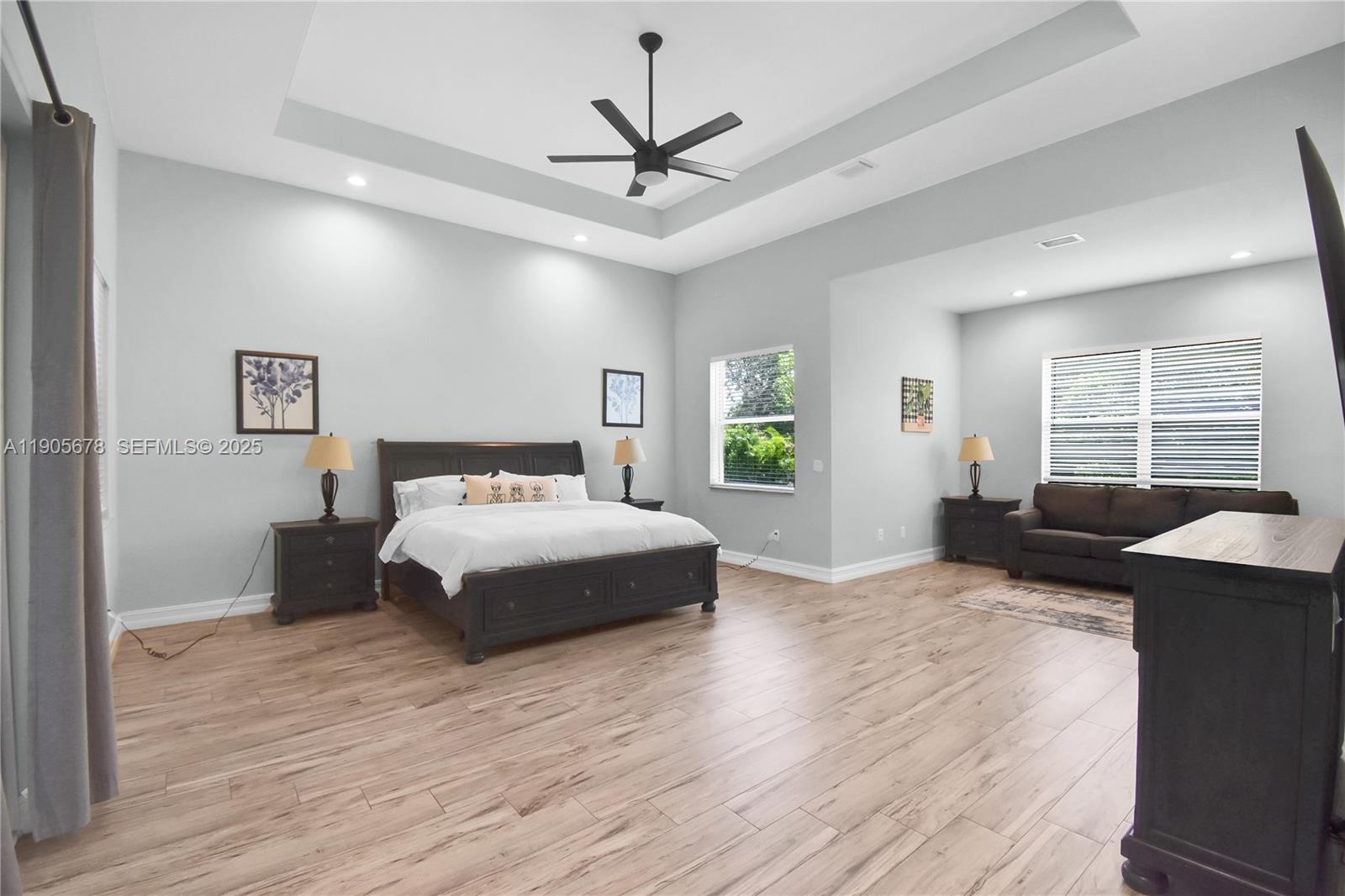 16541 Southwest 62nd Street Southwest Ranches, FL 33331 - Photo 17 of 37 a bedroom with a bed window and a desk