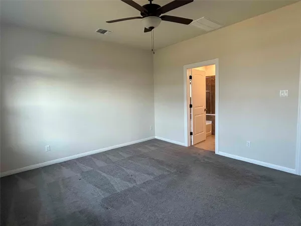 a bathroom with a tub and a sink
