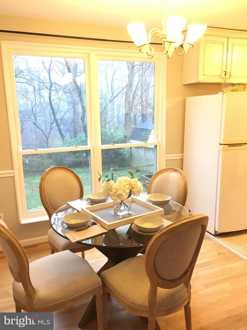 4012 Highview Drive Silver Spring, MD 20906 - Photo 11 of 18 Dinning room with amazing view of the backyard