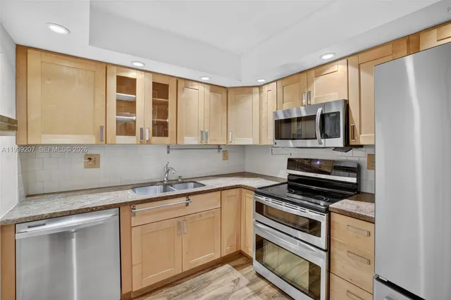 a view of building with an outdoor space and seating area