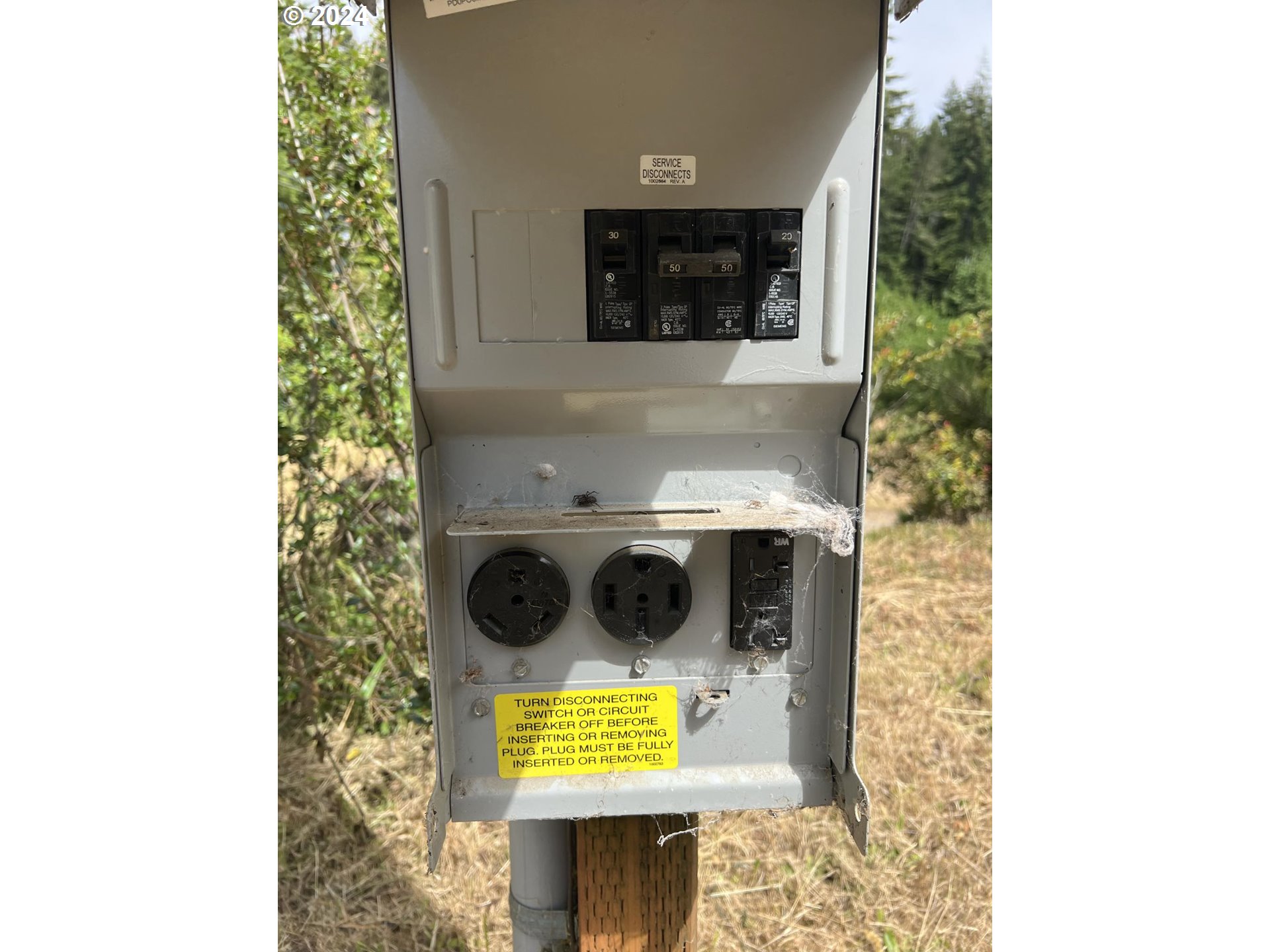 69919 Riddling Road North Bend, OR 97459 - Photo 25 of 28 a utility room with dryer and washer