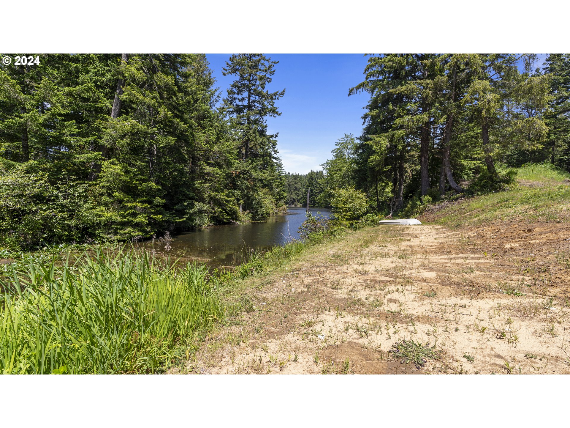 69919 Riddling Road North Bend, OR 97459 - Photo 9 of 28 a open area with a yard