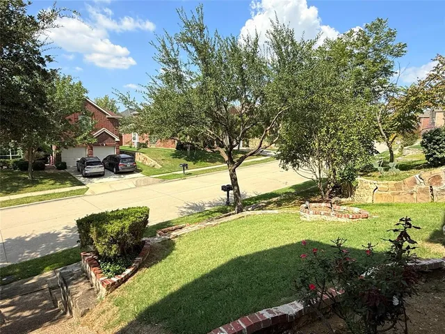 a view of a yard with an outdoor space