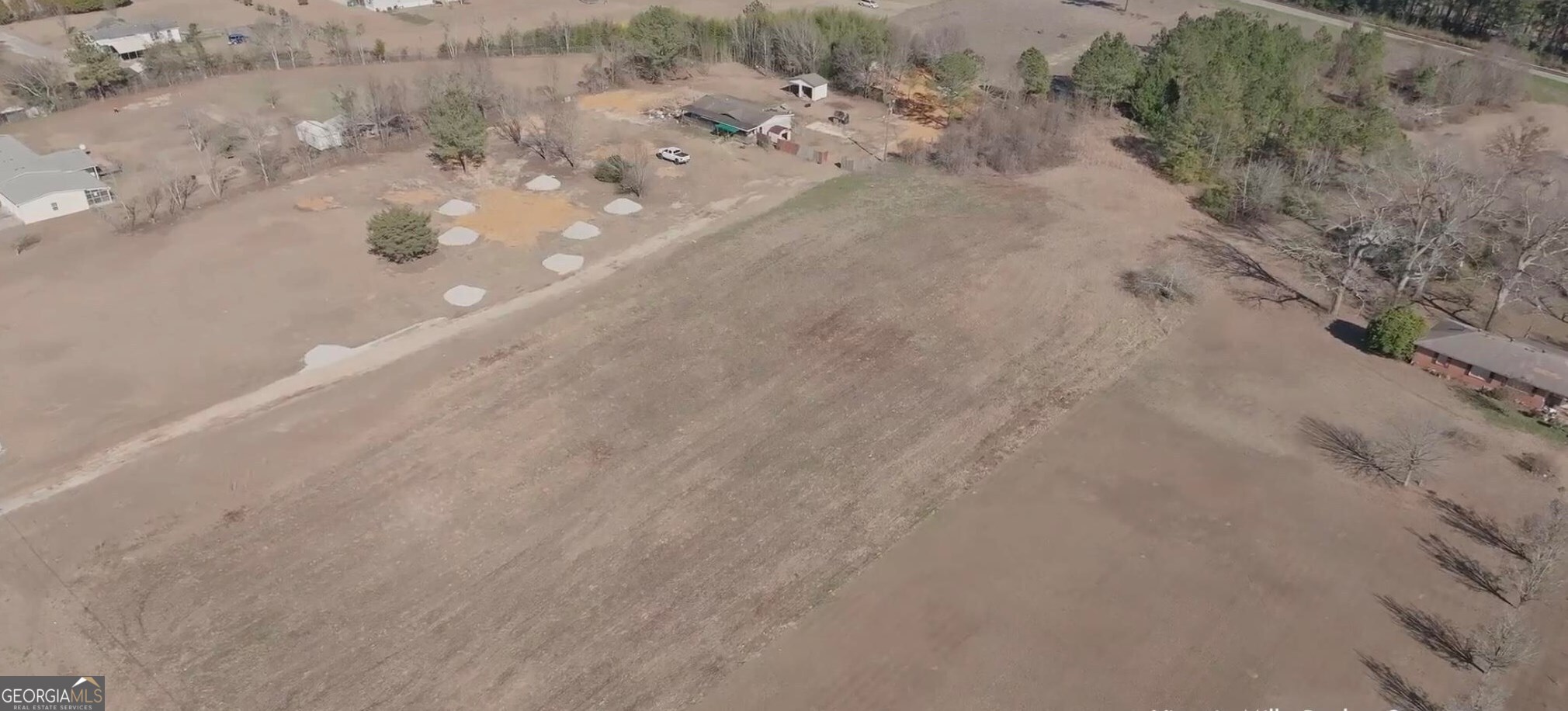 0 Piney Grove Road Kathleen, GA 31047 - Photo 8 of 10 a view of a dry yard with a road