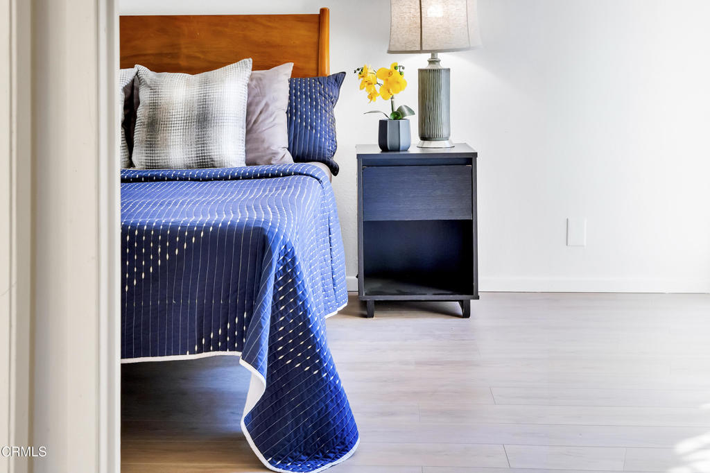 72460 Rodeo Way Rancho Mirage, CA 92270 - Photo 25 of 40 a view of staircase with wooden floor and a potted plant