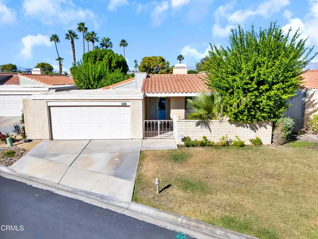 a picture of a house with a yard