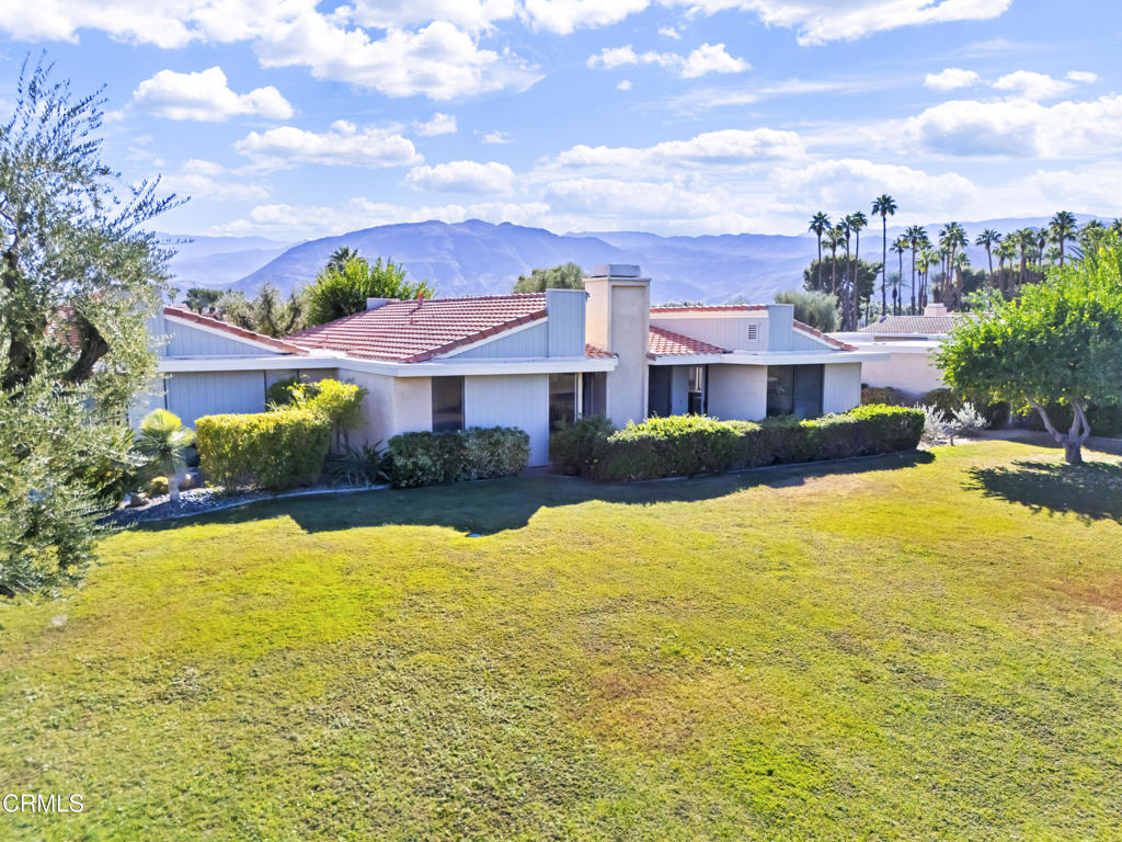 72460 Rodeo Way Rancho Mirage, CA 92270 - Photo 38 of 40 a view of residential houses with yard and swimming pool