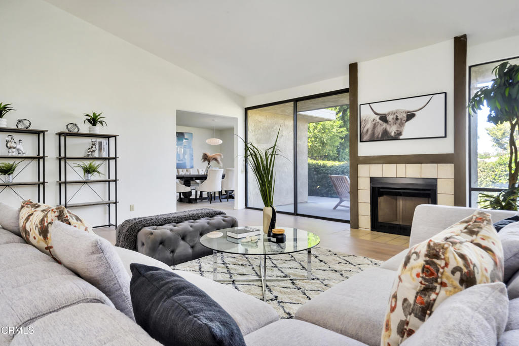 72460 Rodeo Way Rancho Mirage, CA 92270 - Photo 4 of 40 a living room with furniture fireplace and a large window