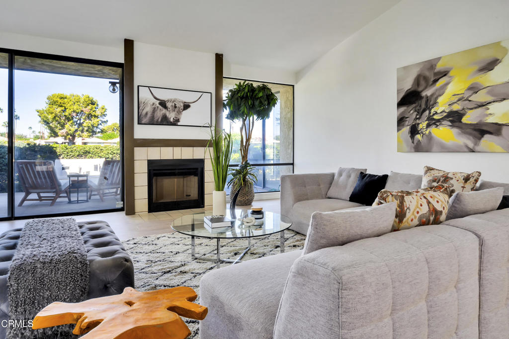 72460 Rodeo Way Rancho Mirage, CA 92270 - Photo 6 of 40 a living room with furniture fireplace and flat screen tv