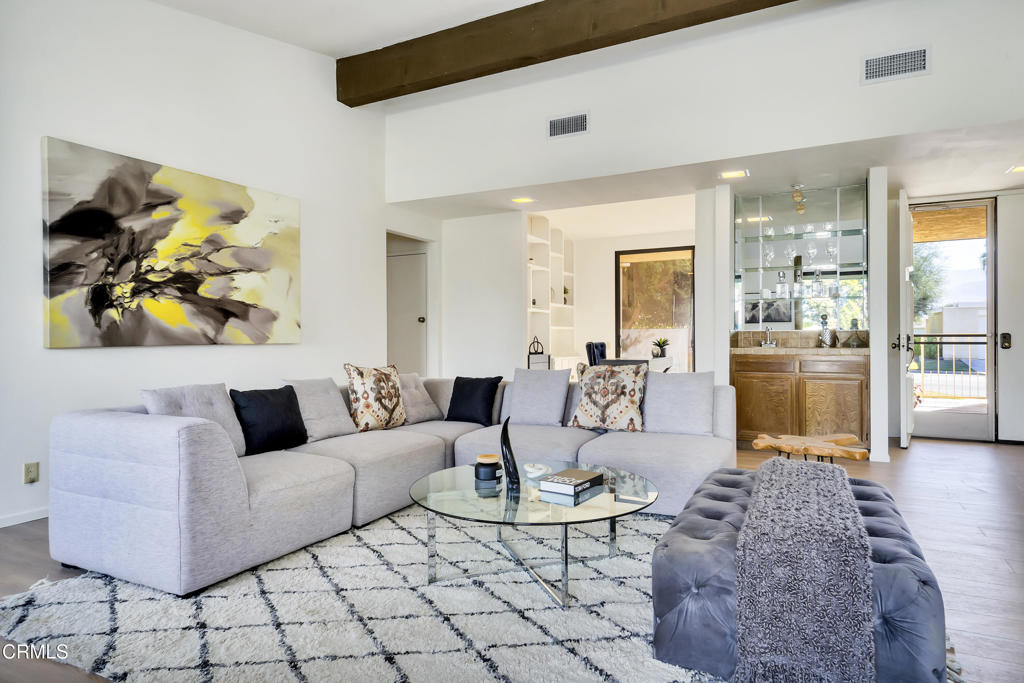 72460 Rodeo Way Rancho Mirage, CA 92270 - Photo 7 of 40 a living room with fireplace furniture and a rug