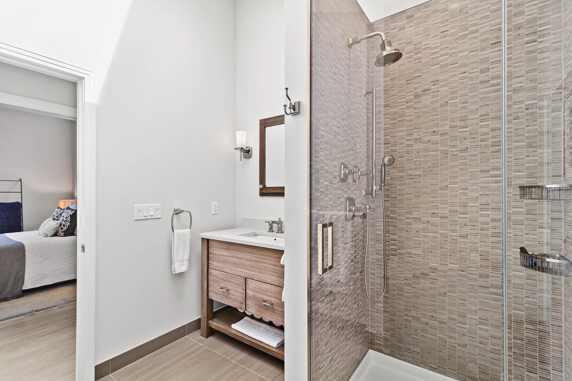 1705 Noyack Road Southampton, NY 11968 - Photo 15 of 16 a bathroom with a sink and a mirror