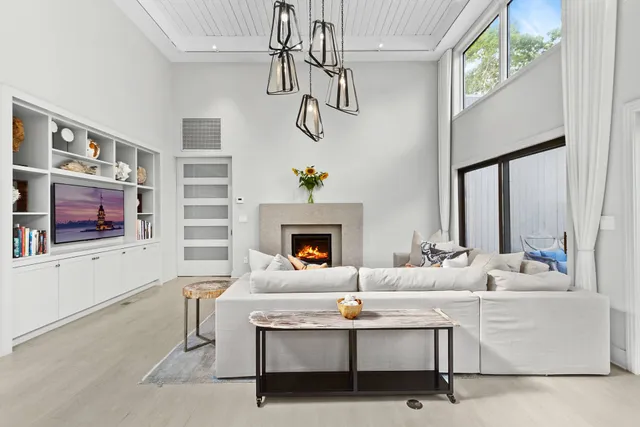 a view of a dining room with furniture and window