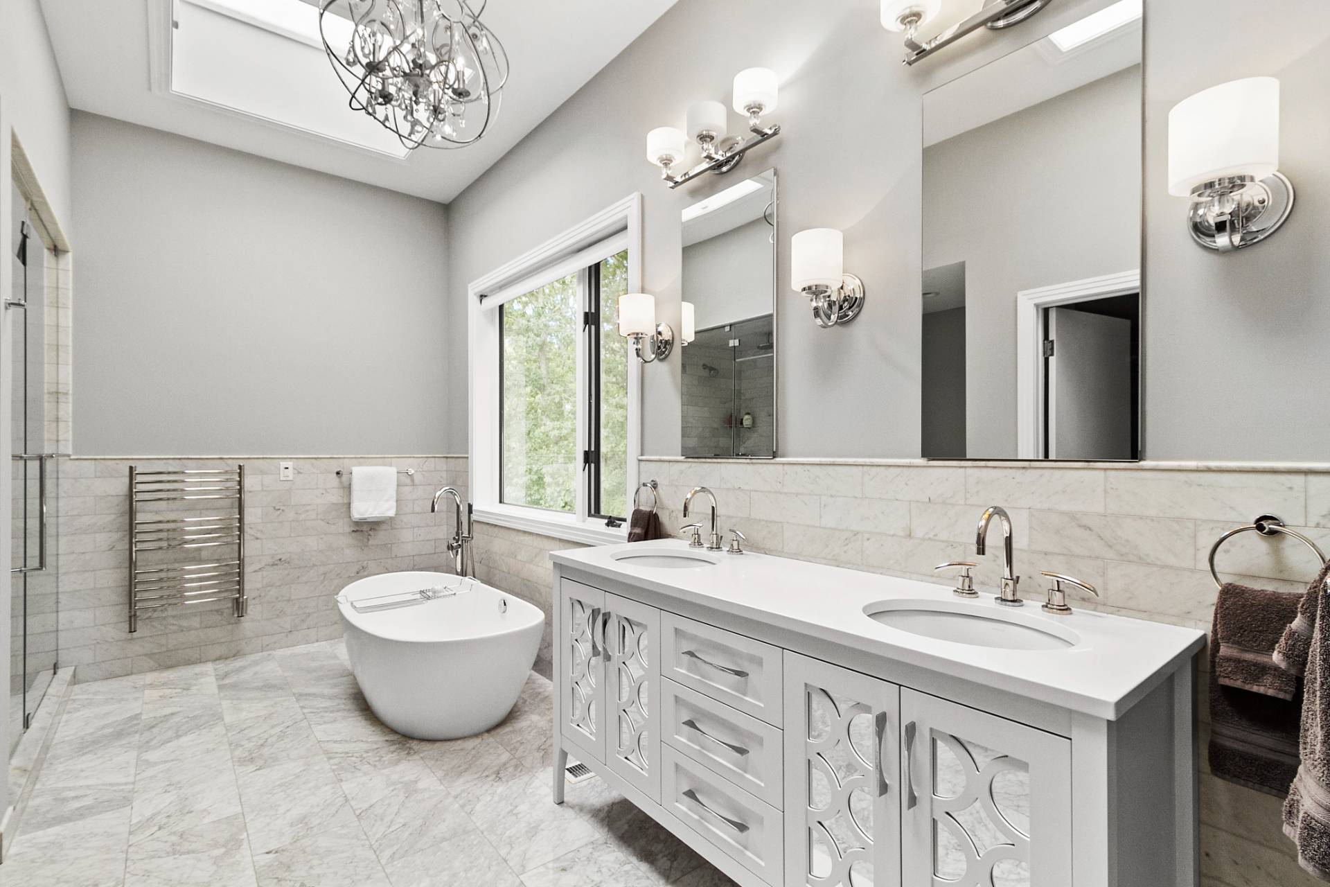 1705 Noyack Road Southampton, NY 11968 - Photo 10 of 16 a spacious bathroom with a double vanity sink mirror and double