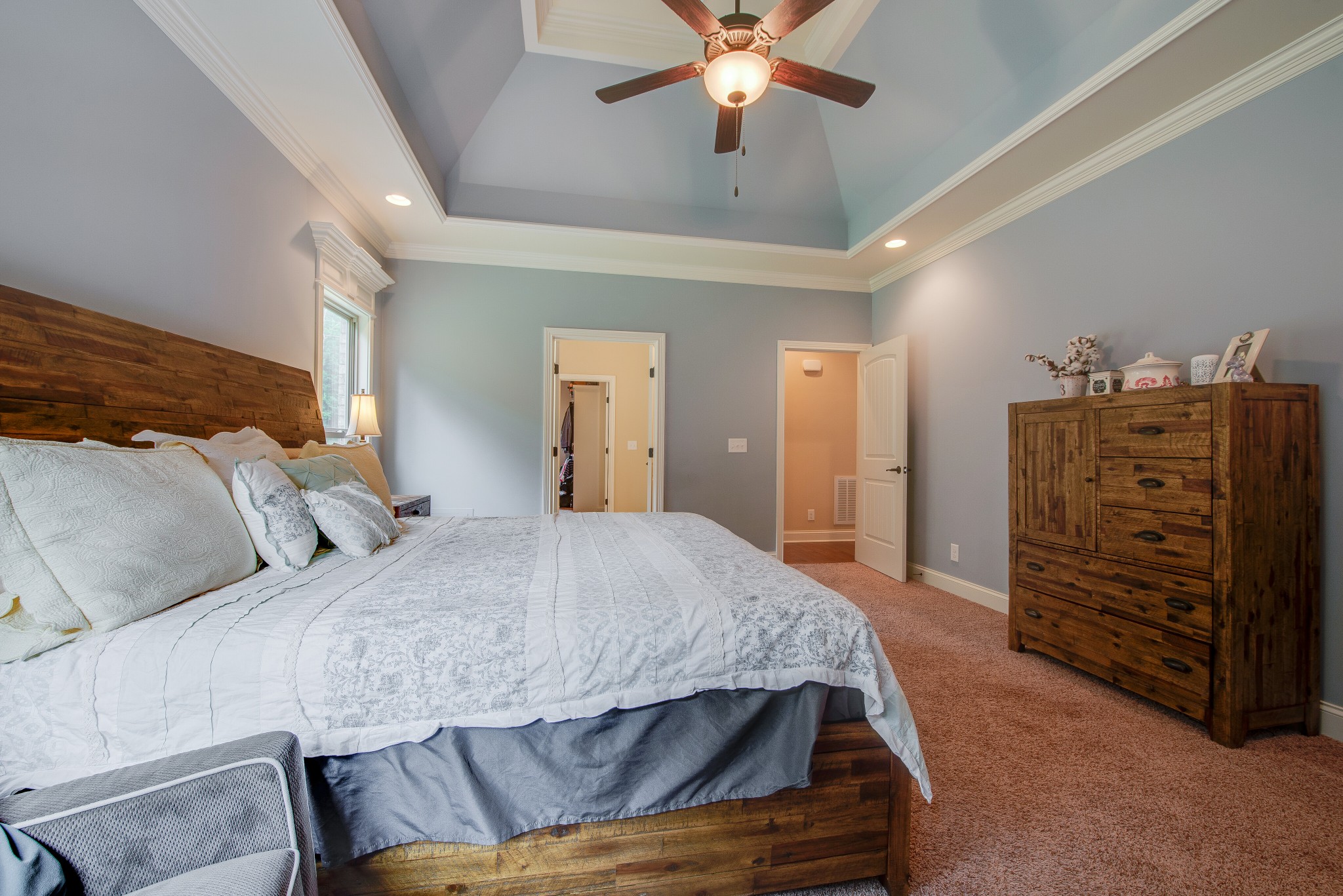 898 Lock 5 Road Lebanon, TN 37087 - Photo 22 of 50 a bedroom with a bed and a chandelier