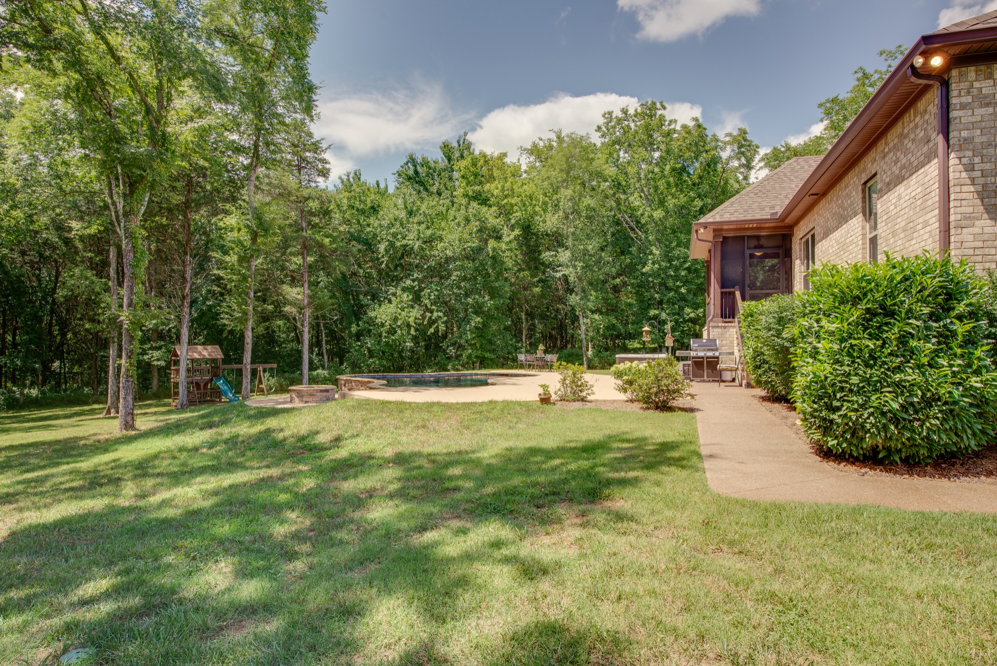 898 Lock 5 Road Lebanon, TN 37087 - Photo 40 of 50 a view of a backyard with large trees