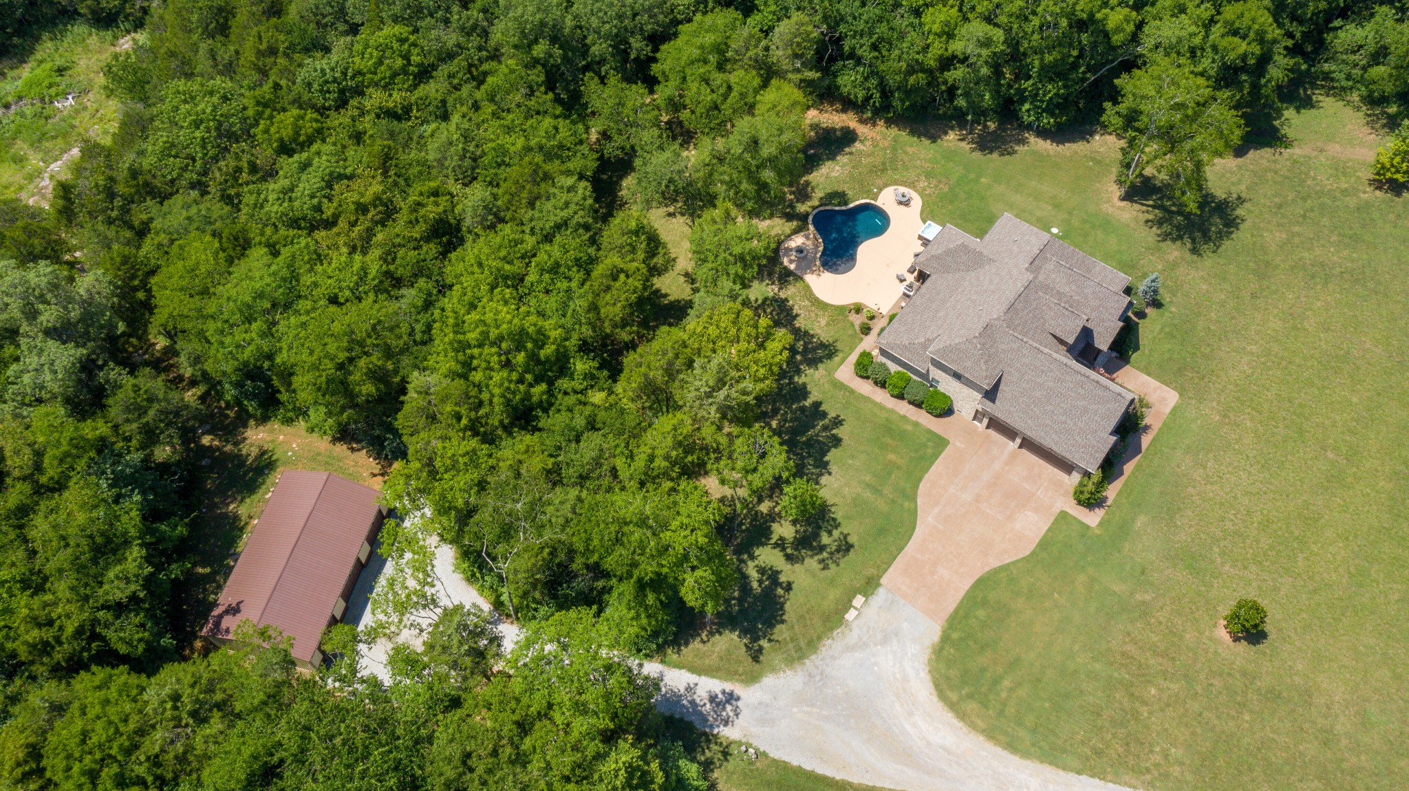 898 Lock 5 Road Lebanon, TN 37087 - Photo 50 of 50 an aerial view of a house with a yard and lake view