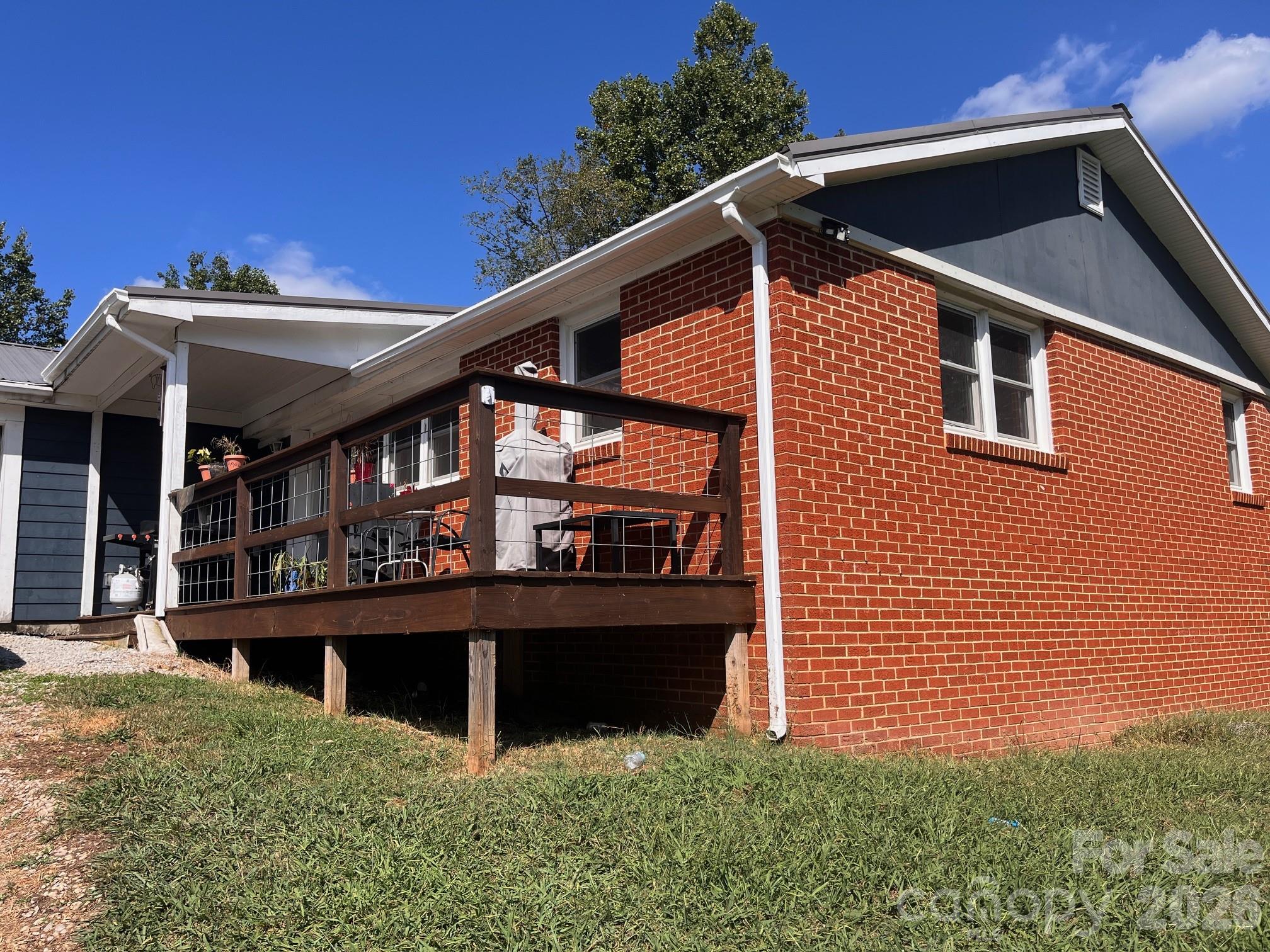 54 Dee Cable Drive Marion, NC 28752 - Photo 15 of 16 a front view of a house with balcony
