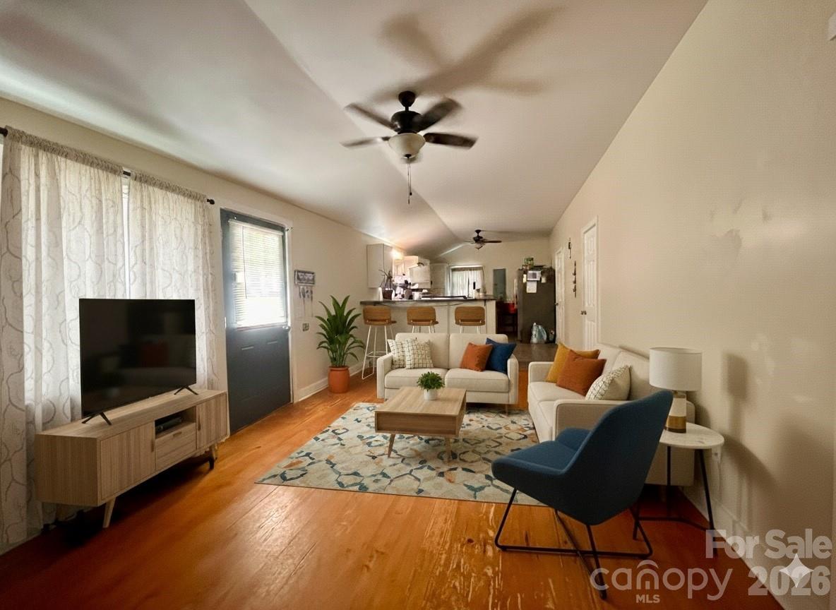 54 Dee Cable Drive Marion, NC 28752 - Photo 7 of 16 a living room with furniture and a flat screen tv