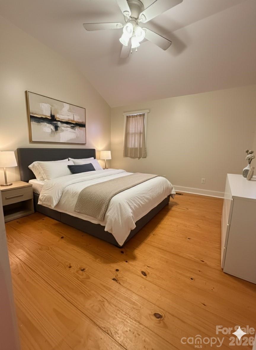 54 Dee Cable Drive Marion, NC 28752 - Photo 8 of 16 a bedroom with a bed and window