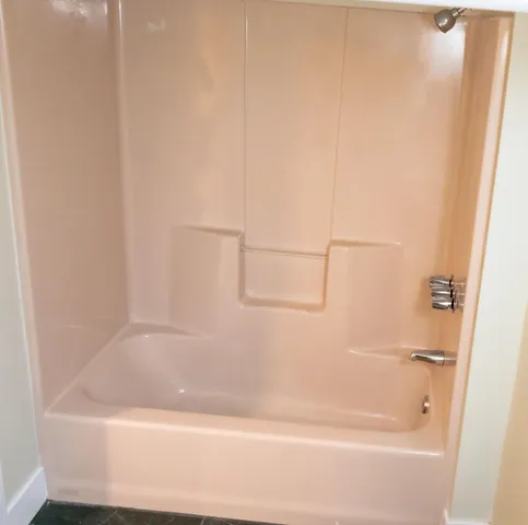 a bathroom with a bathtub