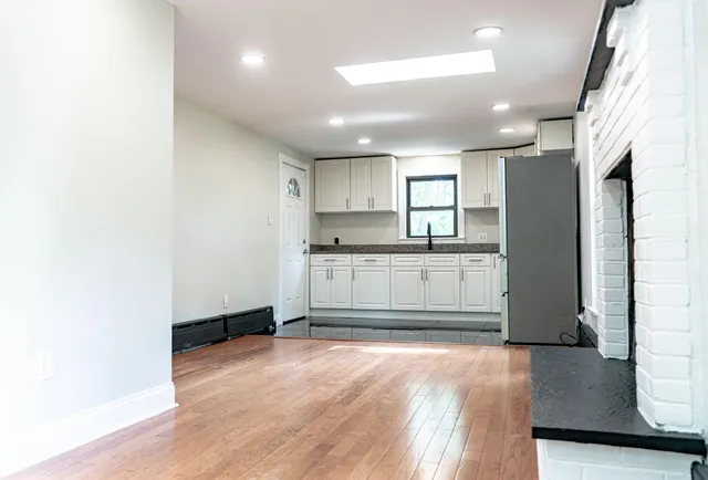 a view of a kitchen with a sink and dishwasher