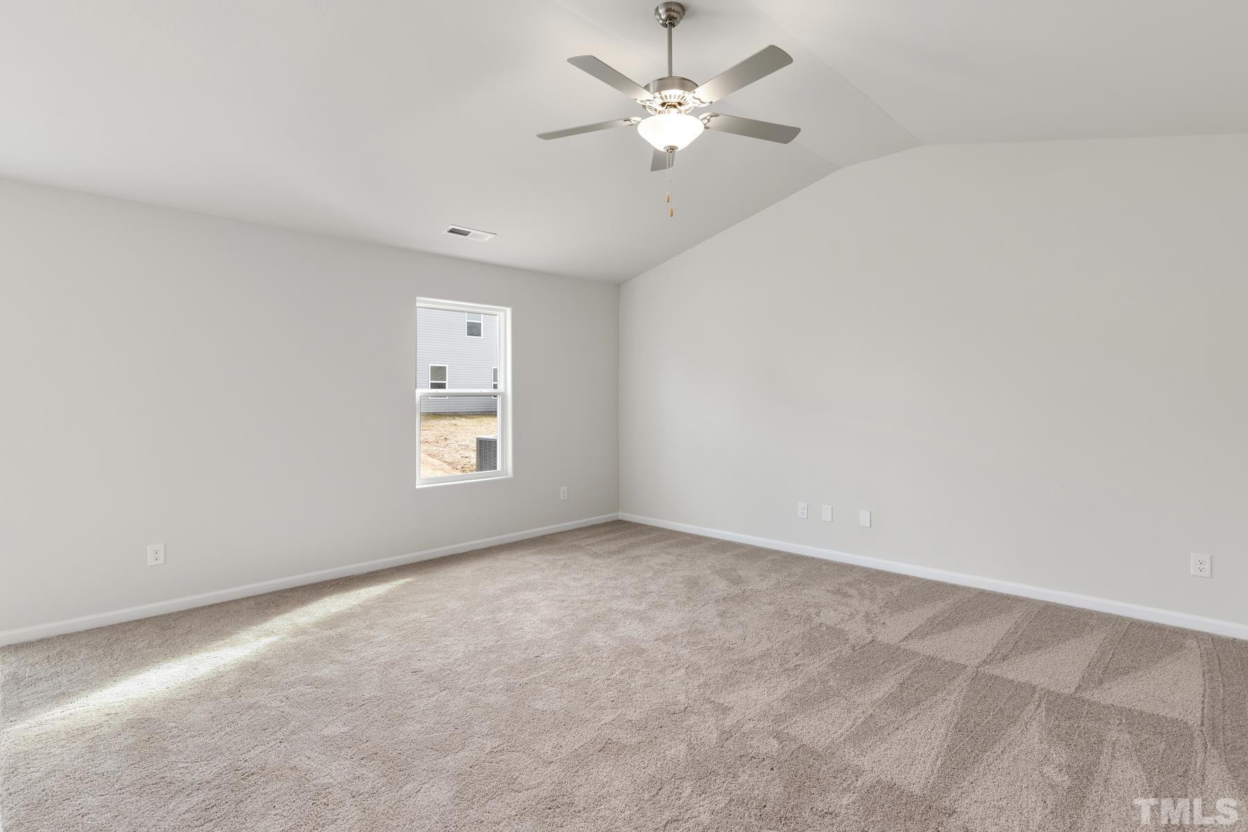 470 Crow Field Street Roxboro, NC 27574 - Photo 3 of 17 an empty room with windows and fan