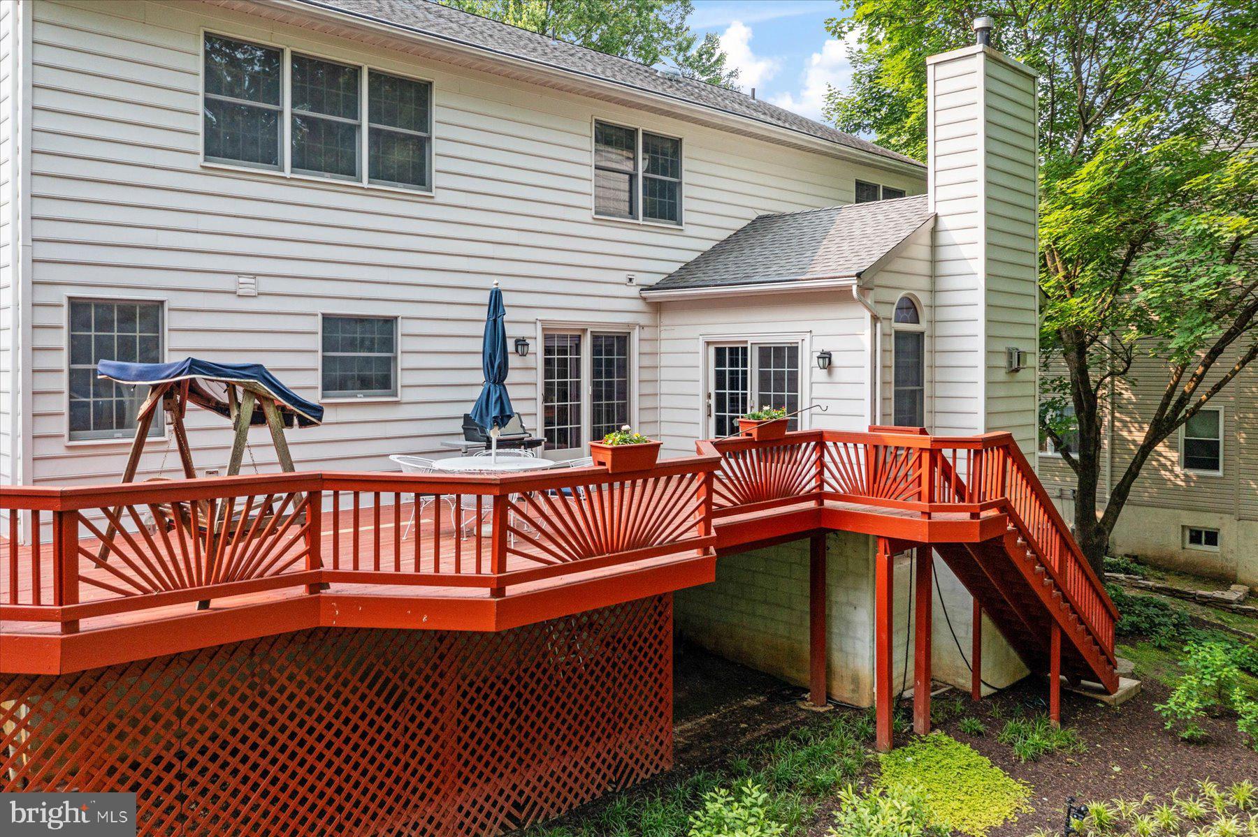 6008 Winter Grain Path Clarksville, MD 21029 - Photo 42 of 53 a view of a wooden deck with chairs and a yard