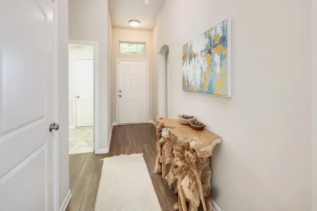 a en suite bathroom with a sink and mirror