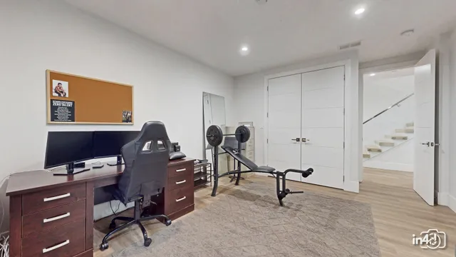 a view of a workspace with furniture