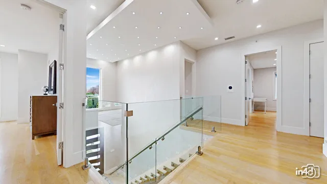 a view of a hallway with seating area