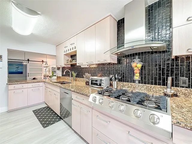 a view of a livingroom with furniture and window