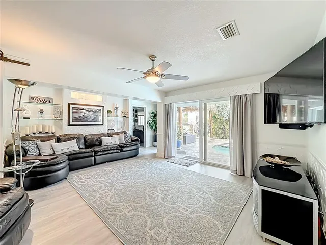 swimming pool view with a outdoor seating