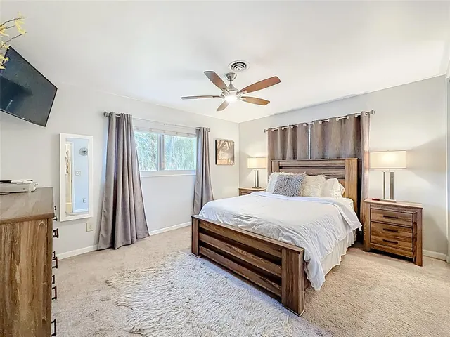 a view of a swimming pool with a lounge chairs