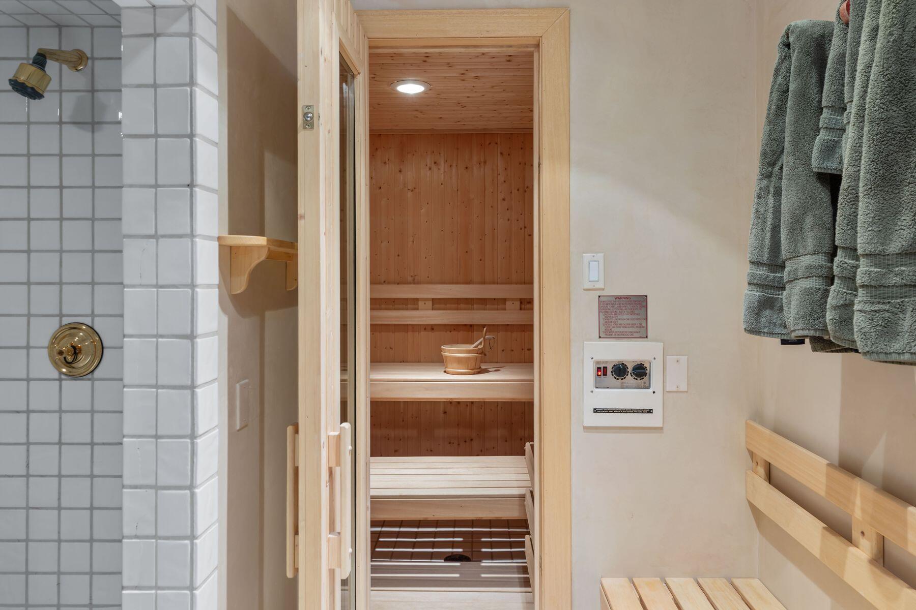222 High Country Road Mountain Village, CO 81435 - Photo 28 of 37 a bathroom with a shower