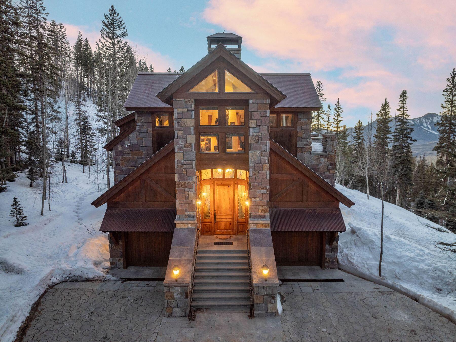 222 High Country Road Mountain Village, CO 81435 - Photo 35 of 37 a front view of a house with a yard