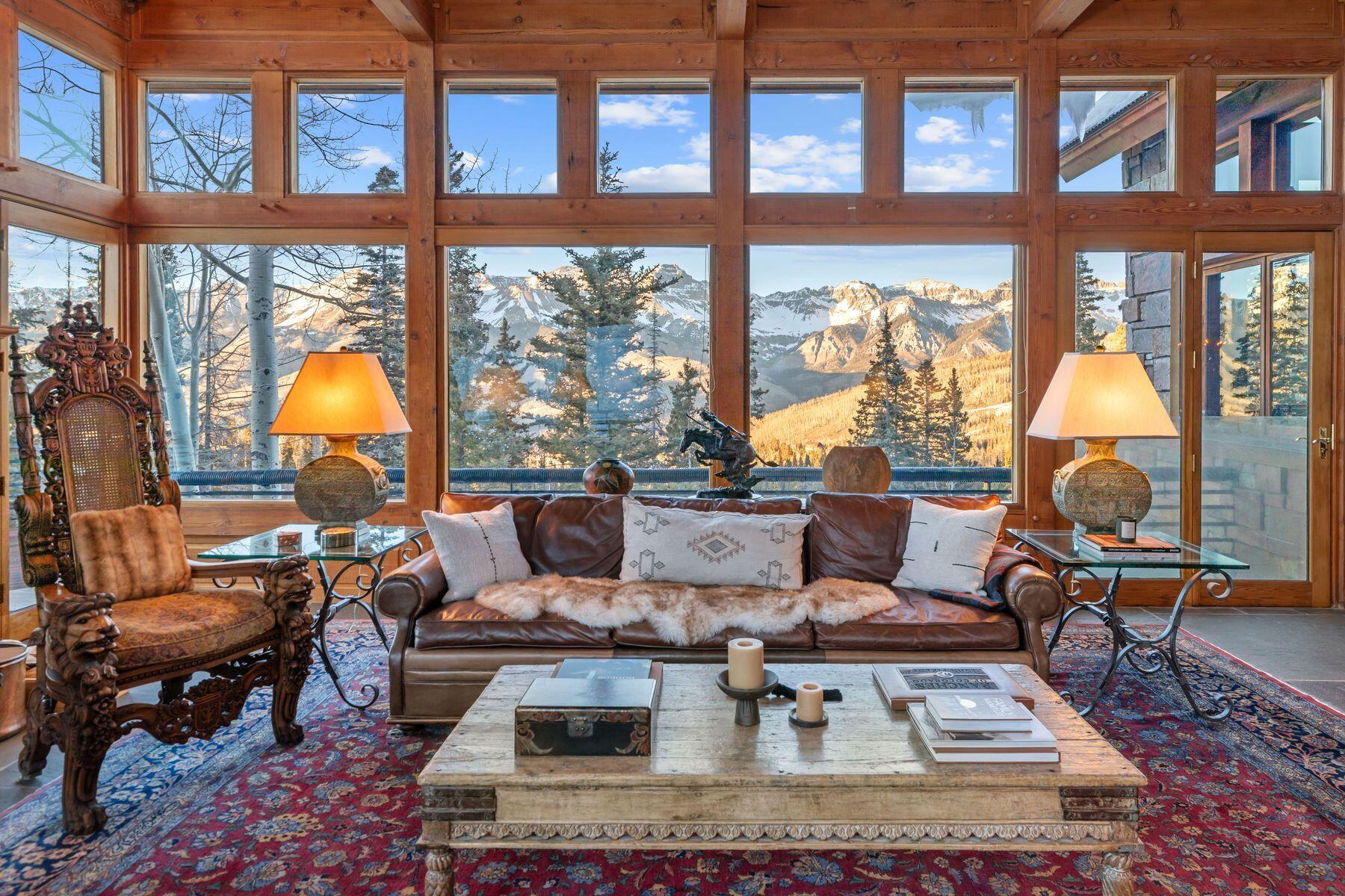 222 High Country Road Mountain Village, CO 81435 - Photo 5 of 37 a living room with furniture and a large window