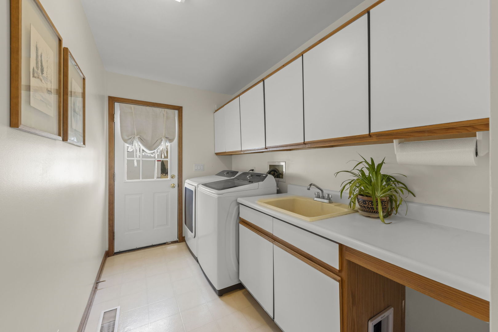 19 Shagbark Lane Newark, IL 60541 - Photo 17 of 60 a kitchen with a sink a stove and cabinets
