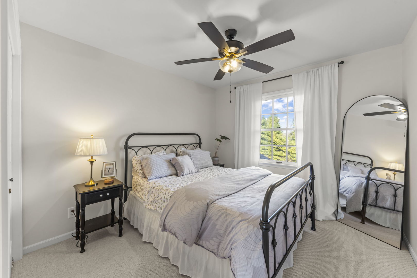 19 Shagbark Lane Newark, IL 60541 - Photo 23 of 60 a bedroom with a bed a chandelier and a dresser