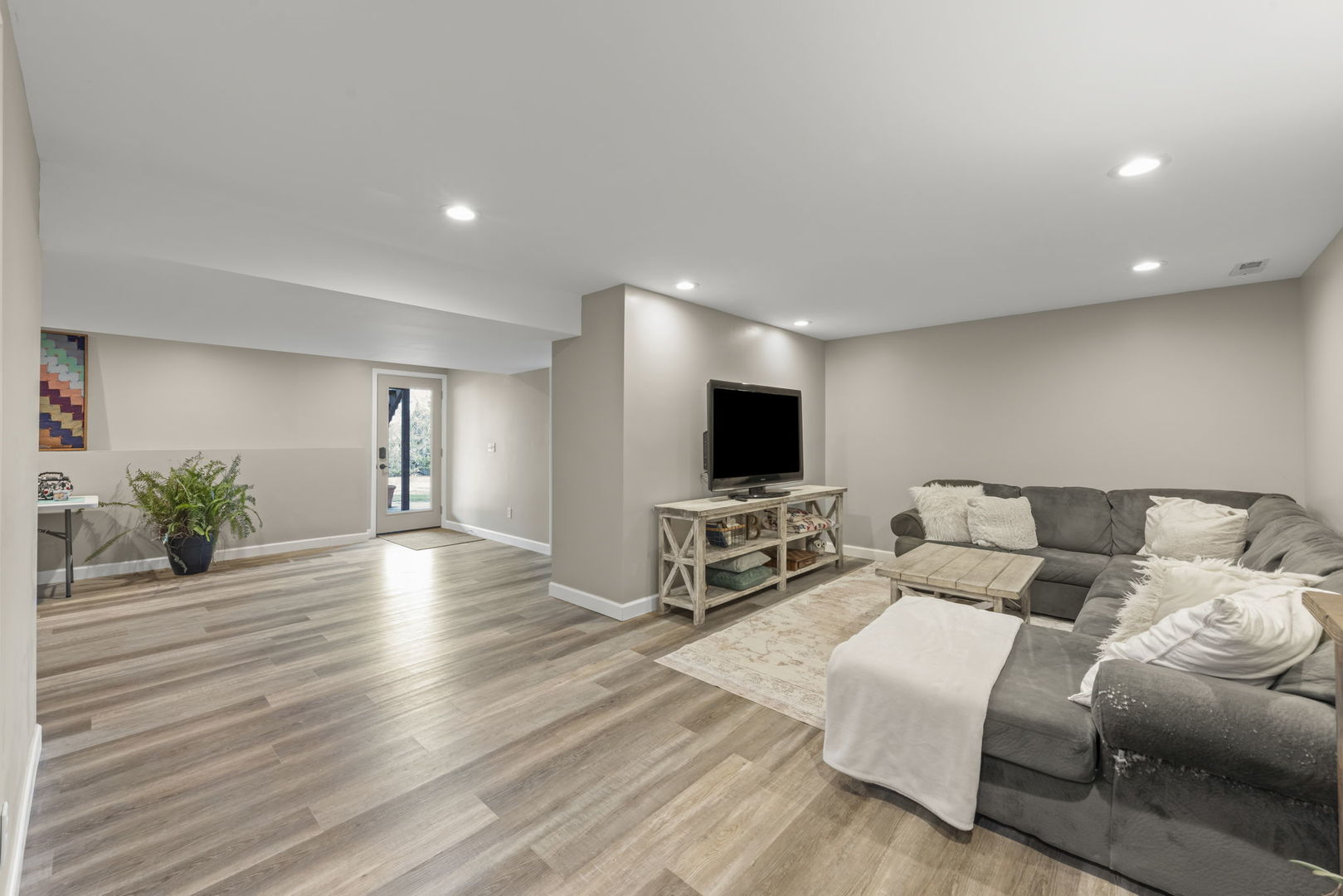 19 Shagbark Lane Newark, IL 60541 - Photo 27 of 60 a living room with furniture and a flat screen tv