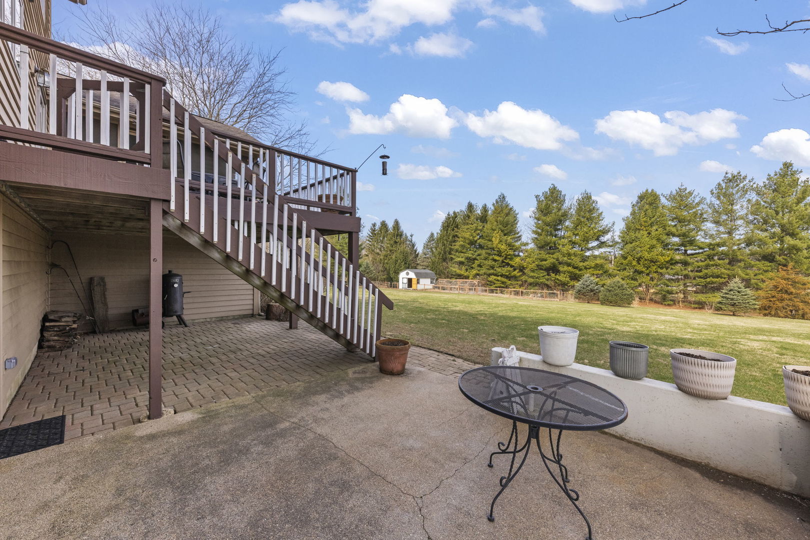 19 Shagbark Lane Newark, IL 60541 - Photo 32 of 60 a view of a backyard with plants and lake