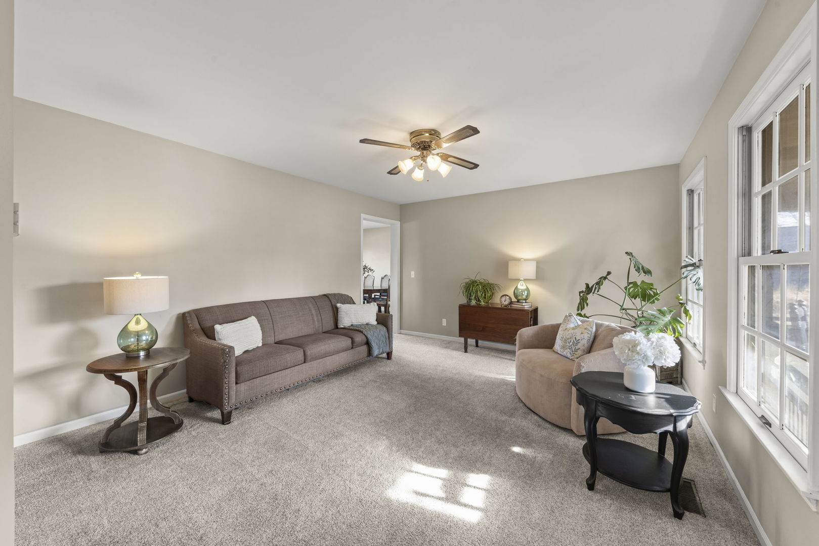 19 Shagbark Lane Newark, IL 60541 - Photo 7 of 60 a living room with furniture and a chandelier