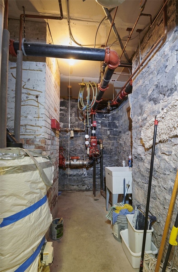 68 North Division Street Auburn, NY 13021 - Photo 3 of 39 Janitor room and sprinkler system