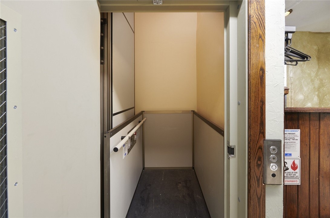 68 North Division Street Auburn, NY 13021 - Photo 6 of 39 wheelchair lift elevator