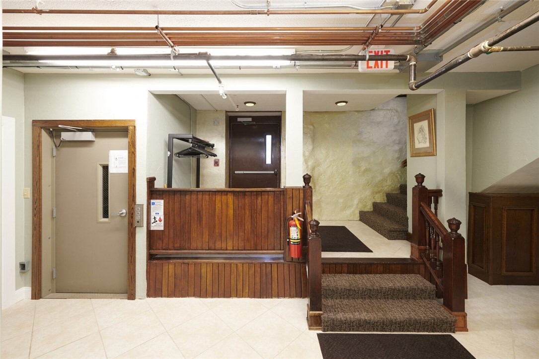 68 North Division Street Auburn, NY 13021 - Photo 7 of 39 Lower foyer