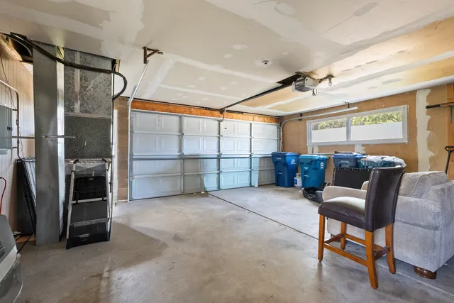 a view of a garage with cars