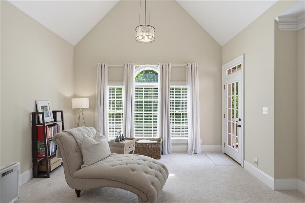 14442 Club Circle Milton, GA 30004 - Photo 29 of 82 a living room with furniture and a floor to ceiling window